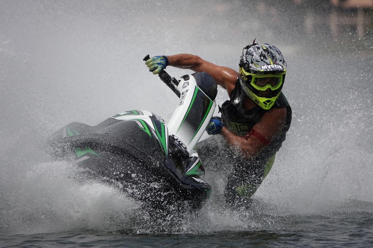 Jet skier turning in water