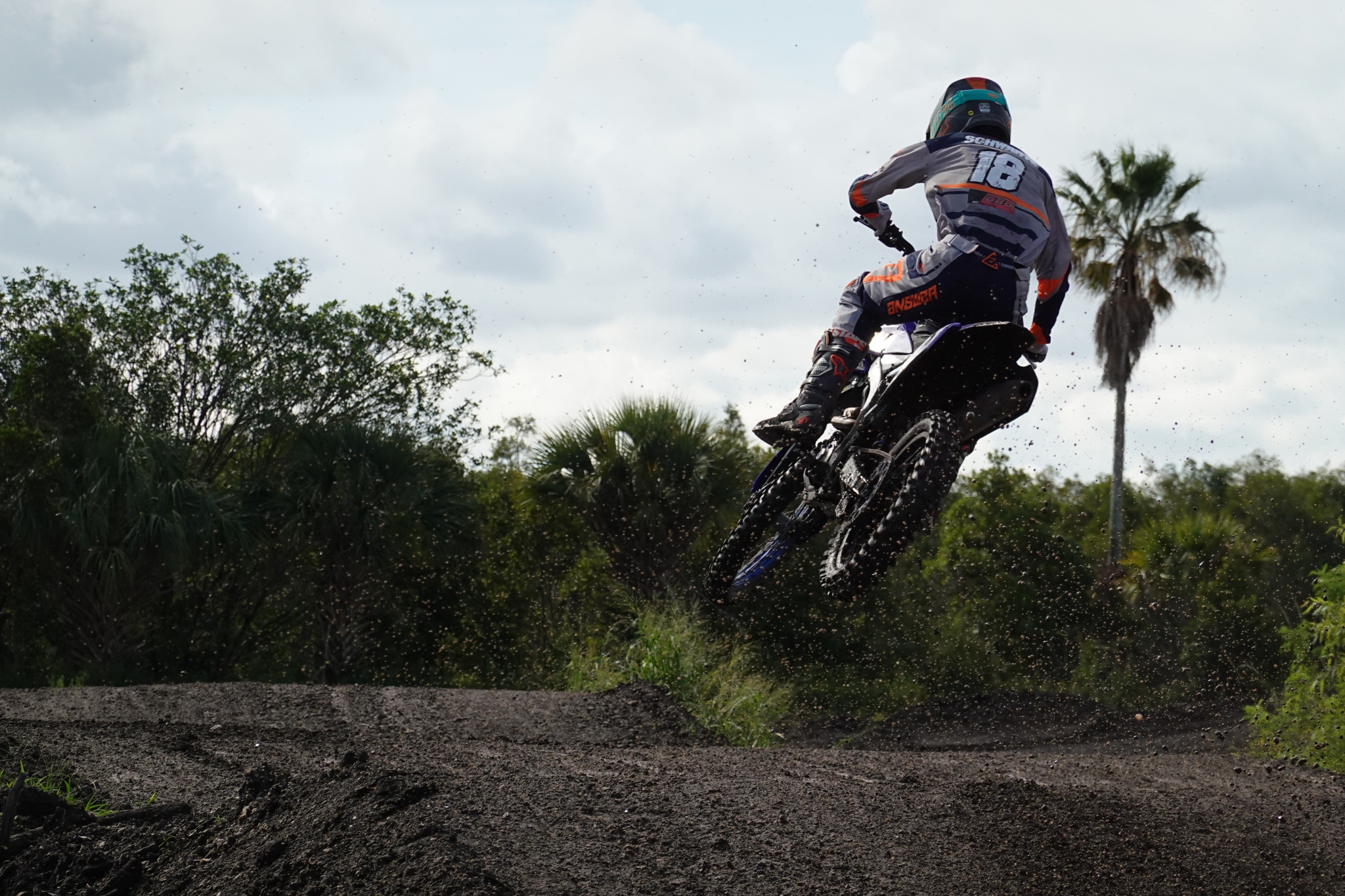 Rider on a motorcross bike on a dirt track