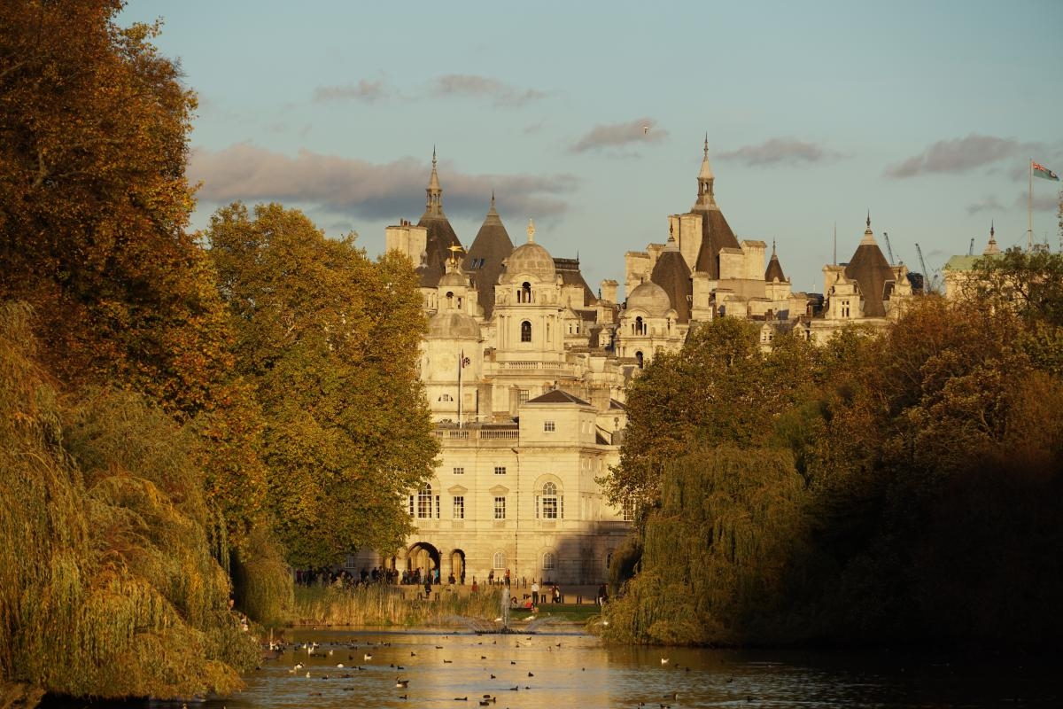  Tree-lined view of classical building over water (Horse Guards Parade from St. James's Park, London)