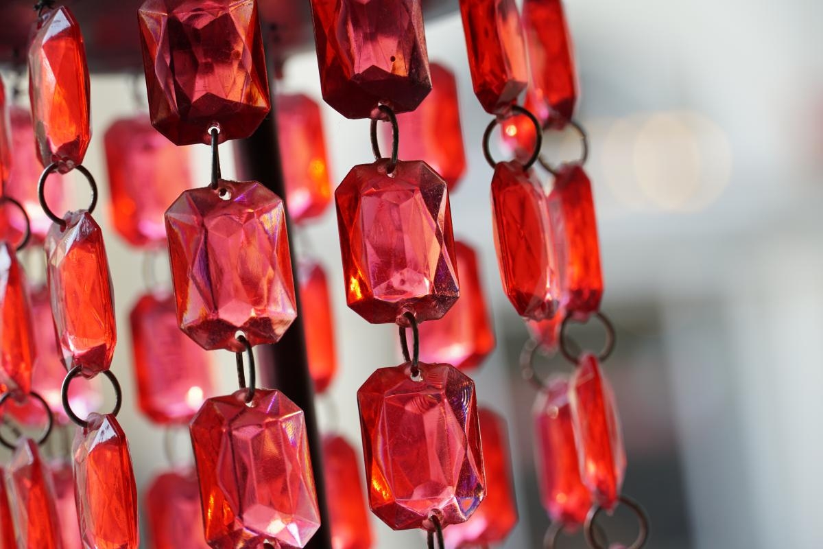 Close-up of linked red glass beads