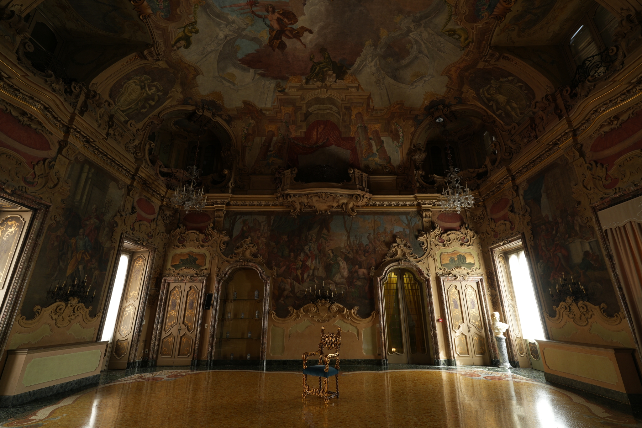 Room with wall and ceiling paintings