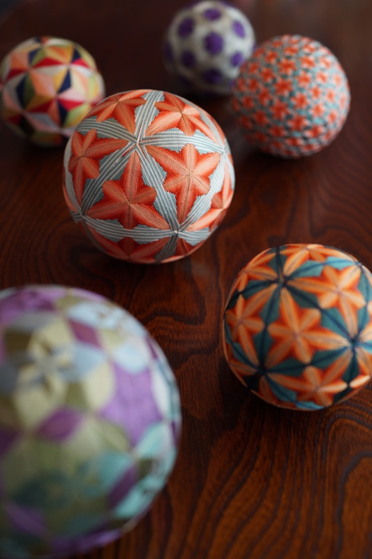 Several decorated globes with various patterns