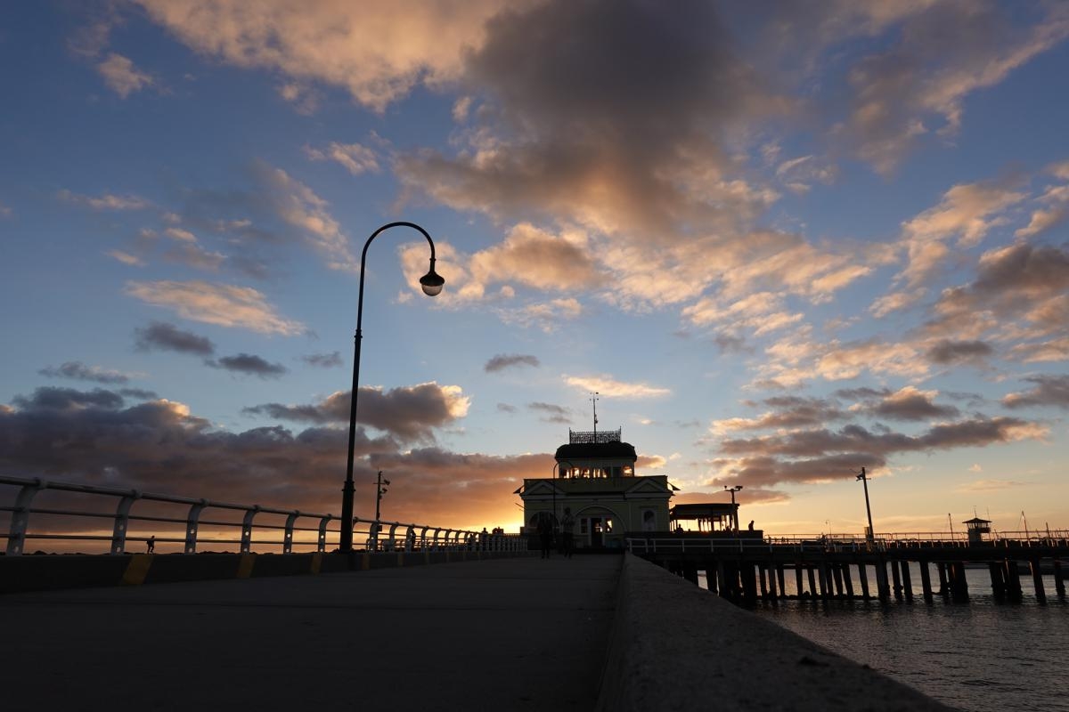 Oceanside pier silhouetted against sunset