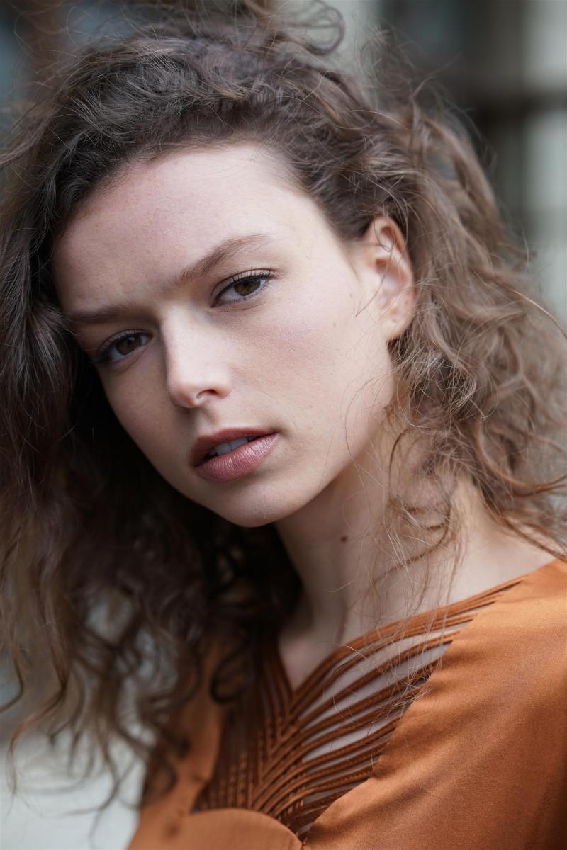 Near-frontal portrait of woman looking toward the camera