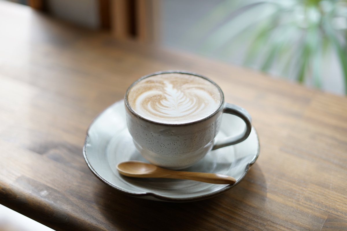 Close-up of coffee in cup showing design on surface