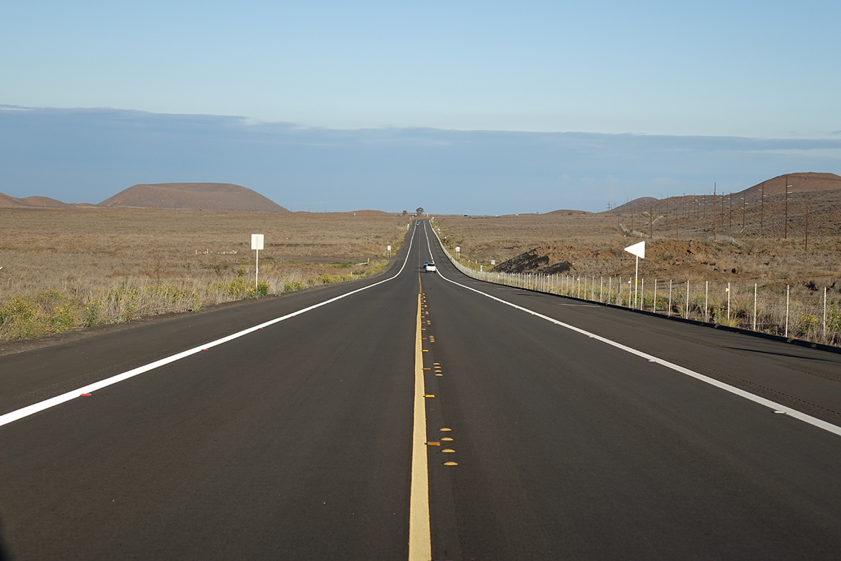 View down centre line of straight road