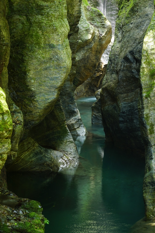 River flowing between high rock walls